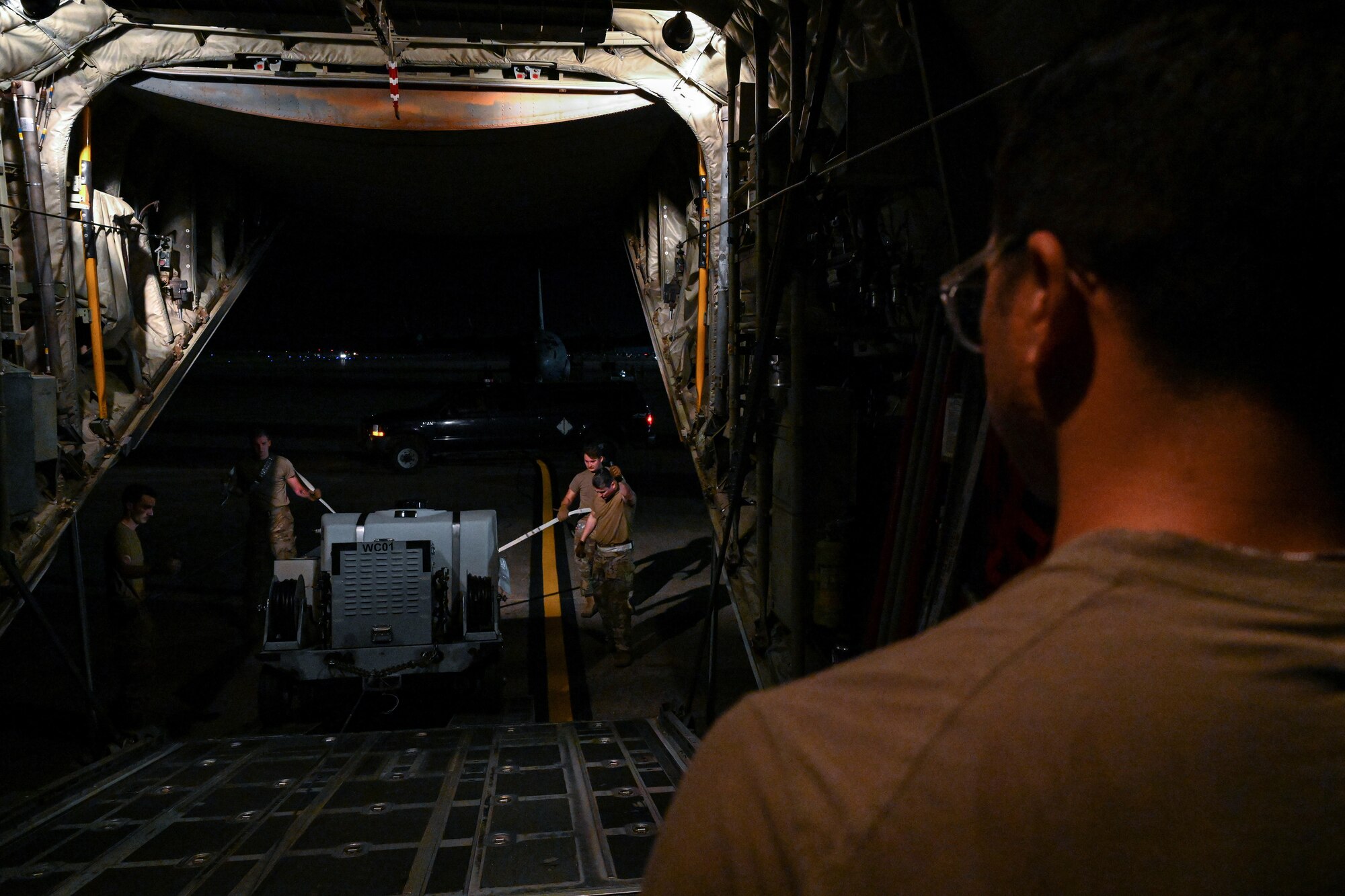 Airmen and aircraft from the 19th Airlift Wing participate in a rocket launch exercise