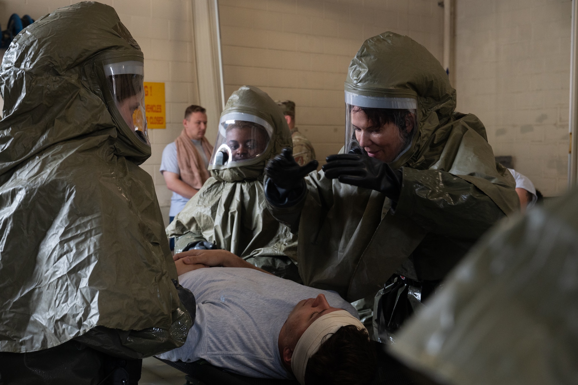 8th Operational Medical Readiness Human Performance Flight commander, leads the patient decontamination team during a mass casualty training event at Kunsan Air Base