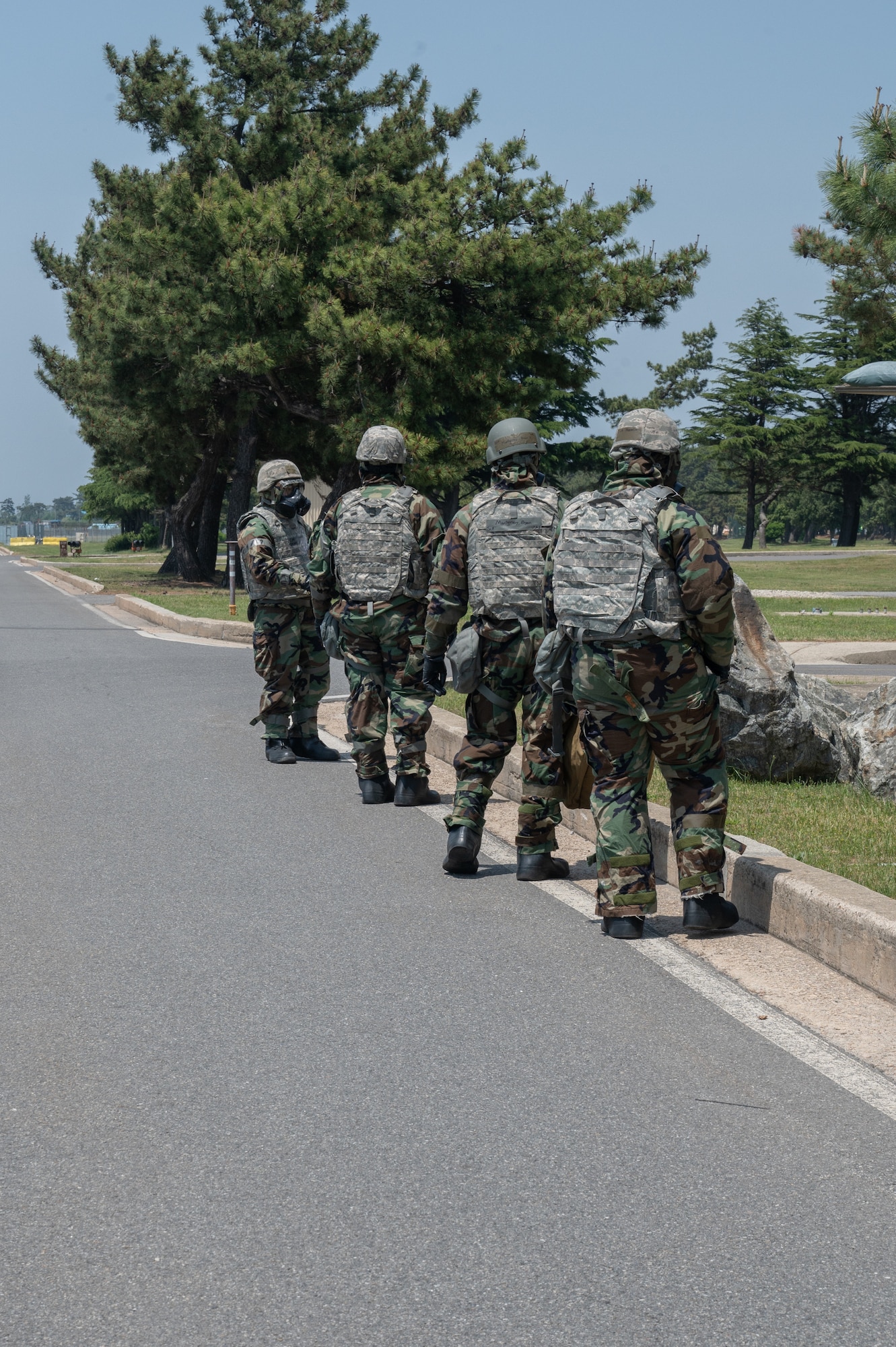 8th Fighter Wing Airmen simulate a post-attack reconnaissance sweep during a training event at Kunsan Air Base