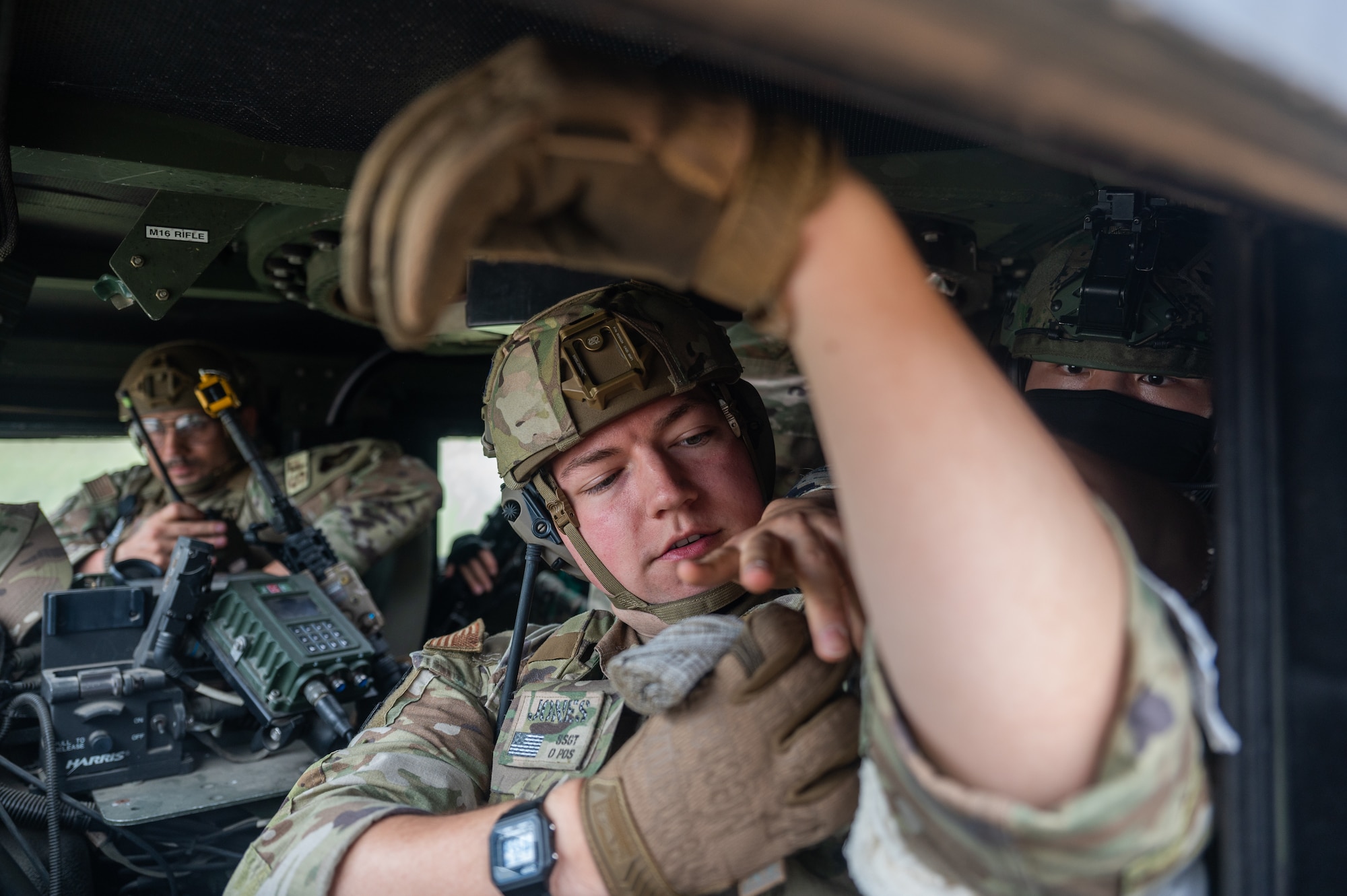 8th Security Forces Squadron Defender, applies a bandage with assistance from a Republic of Korea Army soldier