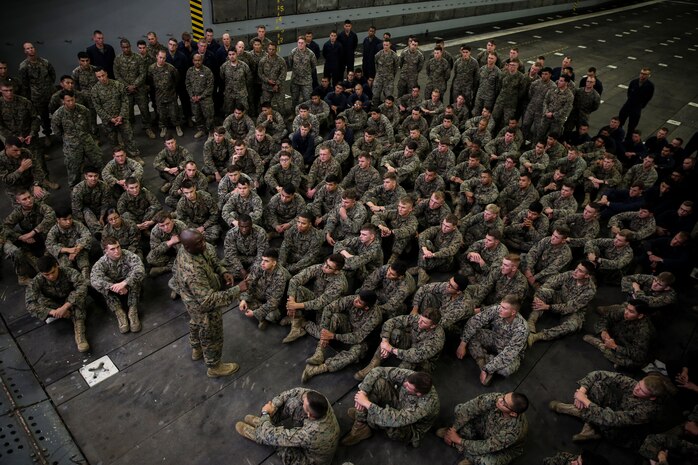 PACIFIC OCEAN, Calif., –  Sgt. Maj. Dennis Campbell, sergeant major of the 15th Marine Expeditionary Unit shares a story of his past experiences on deployment with the Marines and Sailors of the 15th MEU aboard the USS San Diego during PHIBRON-MEU Integration, April 7, 2017. Along with learning to work side-by-side with their Navy counterparts, mentorship plays a major role in preparing the 15th MEU for their upcoming deployment. This Navy-Marine Corps team supports combatant commanders in maintaining regional maritime security and stability while providing offshore options to deter, influence and win in an era of uncertainty. (U.S. Marine Corps photo by Cpl. Timothy Valero)