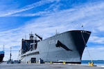 USNS John Lewis (T-AO 205) sits pierside at Naval Surface Warfare Center, Port Hueneme Division (NSWC PHD), Friday, Nov. 4, 2022. The U.S. Navy fleet replenishment oiler, delivered to Military Sealift Command in July, is in the beginning months of its year-long ship qualification trials schedule and stopped by NSWC PHD for a stores resupply and minor repairs by builder representatives. The Underway Replenishment (UNREP) fuel and cargo delivery stations aboard the civilian-crewed ship use the new Electric Standard Tensioned Replenishment Alongside Method (E-STREAM) technology, designed by NSWC PHD UNREP engineers. USNS John Lewis is the first oiler to have the new E-STREAM systems on board, and the command’s UNREP team members were excited to see in person the system installed on a ship. (U.S. Navy photo by Dana Rene White/Released)