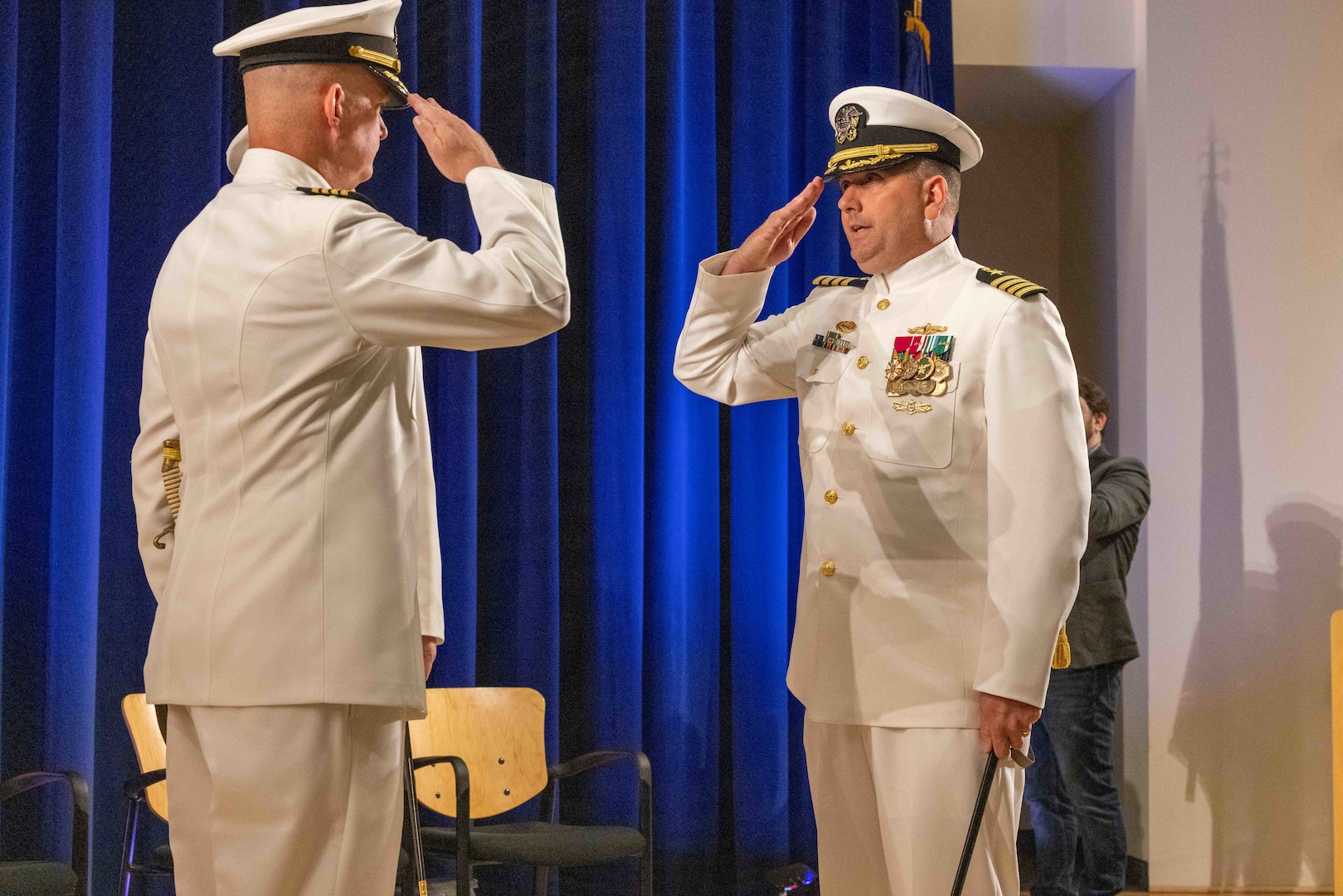 Naval Surface Warfare Center, Carderock Division’s outgoing Commanding Officer, Capt. Todd E. Hutchison (left), salutes Carderock’s incoming Commanding Officer, Capt. Matthew Tardy, during a change-of-command ceremony held in West Bethesda, Md., on May 12. (U.S. Navy photo by Aaron Thomas)