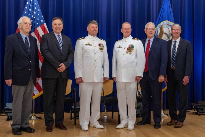 Naval Surface Warfare Center, Carderock Division’s Commanding Officers, both past and present, pose together during a change-of-command ceremony held in West Bethesda, Md., on May 12. From left are Capt. John Preisel, retired Capt. Mark Vandroff, retired, Capt. Matthew Tardy, Capt. Todd E. Hutchison, Capt. Charles Behrle, retired and Capt. Chris Meyer, retired. (U.S. Navy photo by Aaron Thomas)