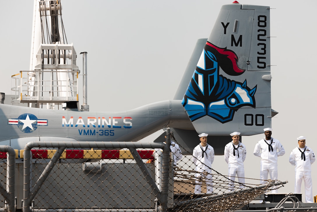 U.S. Navy Sailors man the rails of the amphibious assault ship USS Wasp (LHD 1) as it is escorted into Pier 88 in New York City during the Parade of Ships as part of Fleet Week New York (FWNY), May 24, 2023. FWNY 2023 provides an opportunity for the American public to meet Sailors, Marines, and Coast Guardsmen and see first-hand the latest capabilities of today’s maritime services. (U.S. Marine Corps photo by Sgt. Juan Carpanzano)