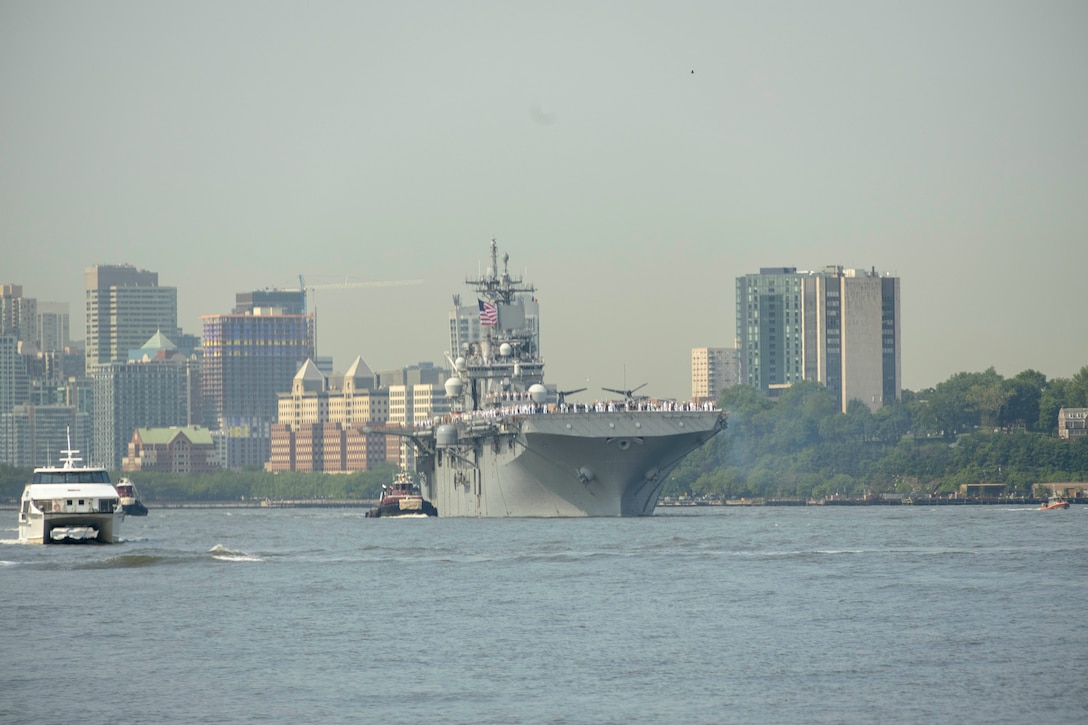 The amphibious assault ship USS Wasp (LHD 1) is escorted through the Hudson River in New York City during the Parade of Ships as part of Fleet Week New York (FWNY), May 24, 2023. FWNY 2023 provides an opportunity for the American public to meet Sailors, Marines, and Coast Guardsmen and see first-hand the latest capabilities of today’s maritime services. (Photo by Mass Communication Specialist 1st Class Pedro A. Rodriguez)