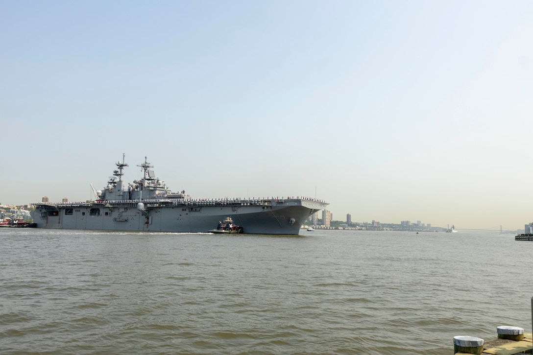 The amphibious assault ship USS Wasp (LHD 1) docks at Pier 88 in New York City during the Parade of Ships as part of Fleet Week New York (FWNY), May 24, 2023. FWNY provides an opportunity for the American public to meet Sailors, Marines, and Coast Guardsmen and see first-hand the latest capabilities of today’s maritime services. (Photo by Mass Communication Specialist 1st Class Pedro A. Rodriguez)