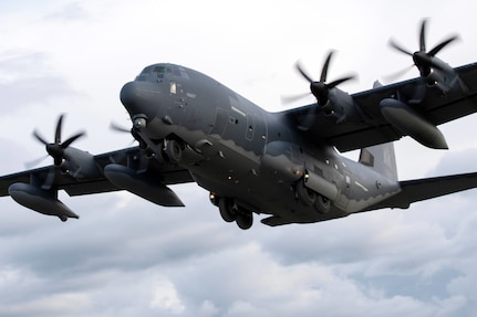 An Alaska Air National Guard HC-130J Combat King II operated by aircrew from the 211th Rescue Squadron, 176th Wing, surveys Malemute Drop Zone during aerial training at Joint Base Elmendorf-Richardson, Alaska, Aug. 18, 2021. The HC-130J Combat King II is a specially modified and upgraded version of the well-known C-130 Hercules transport aircraft.