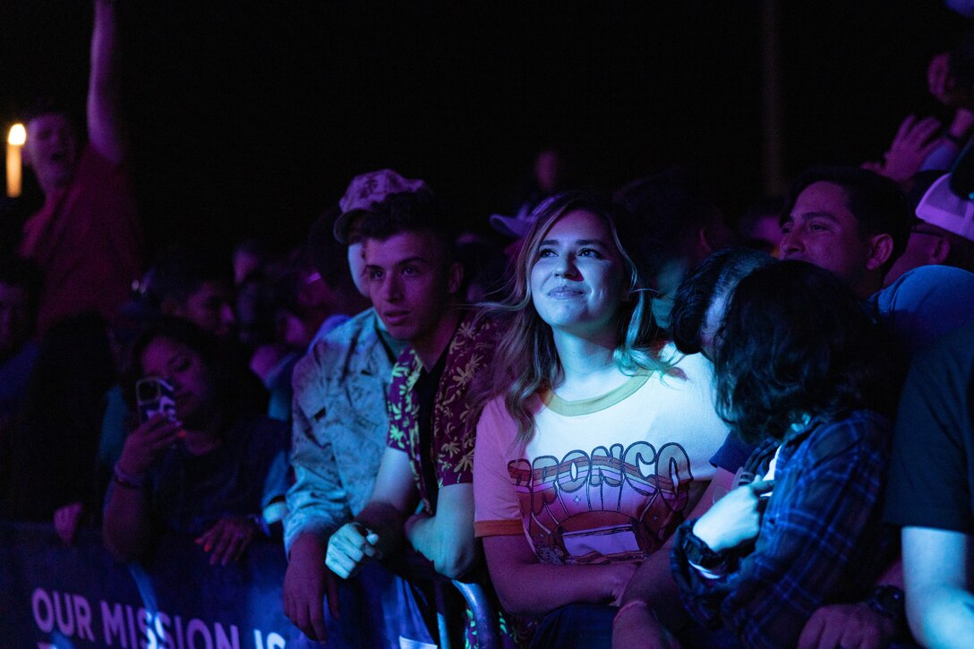 An audience from The Combat Center listens to a 3 Doors Down performance during the We Salute You Celebration at Victory Field at Marine Corps Air-Ground Combat Center, Twentynine Palms, California, May 6, 2023. Grammy-nominated rock band 3 Doors Down headlined this annual Marine Corps Community Services sponsored event meant to honor Combat Center service members and their families by providing food, activities and live entertainment. (U.S. Marine Corps photo by Lance Cpl. Richard PerezGarcia)
