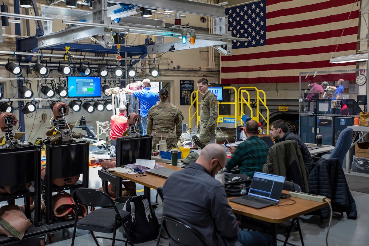 The Air Force Research Laboratory, or AFRL, and NASA work together at the sled test facility at Wright-Patterson Air Force Base, Ohio, April 17, 2023, along with other industry partners, such as Lockheed Martin, to test the next replica of a seat and flight suit that will be used on the Orion space capsule during the next mission to the moon. (U.S. Air Force photo / Rick Eldridge)
