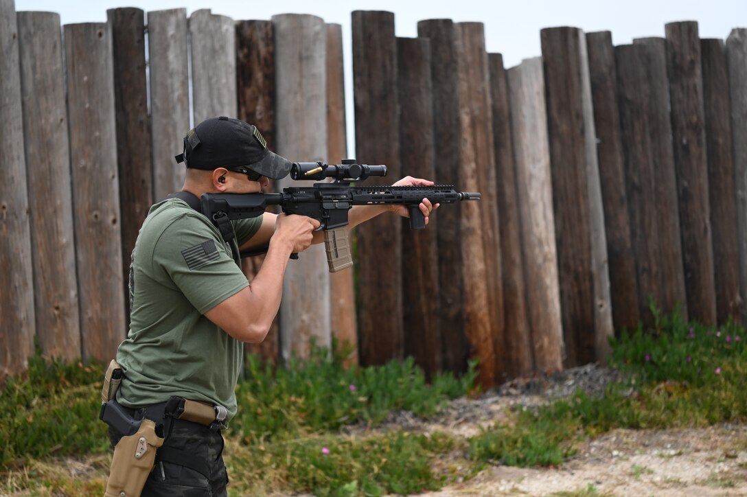 Senior Airman Jonathan Realegeno, 30th Security Forces Squadron conservation patrolman participates in the Vandenberg Rod and Gun Club shooting competition at Vandenberg Space Force Base, Calif., May 17, 2023. National Police Week offers honor, remembrance, and peer support, while allowing law enforcement, survivors, and citizens to gather and pay homage to those who gave their lives in the line of duty. (U.S. Space Force photo by Senior Airman Tiarra Sibley)