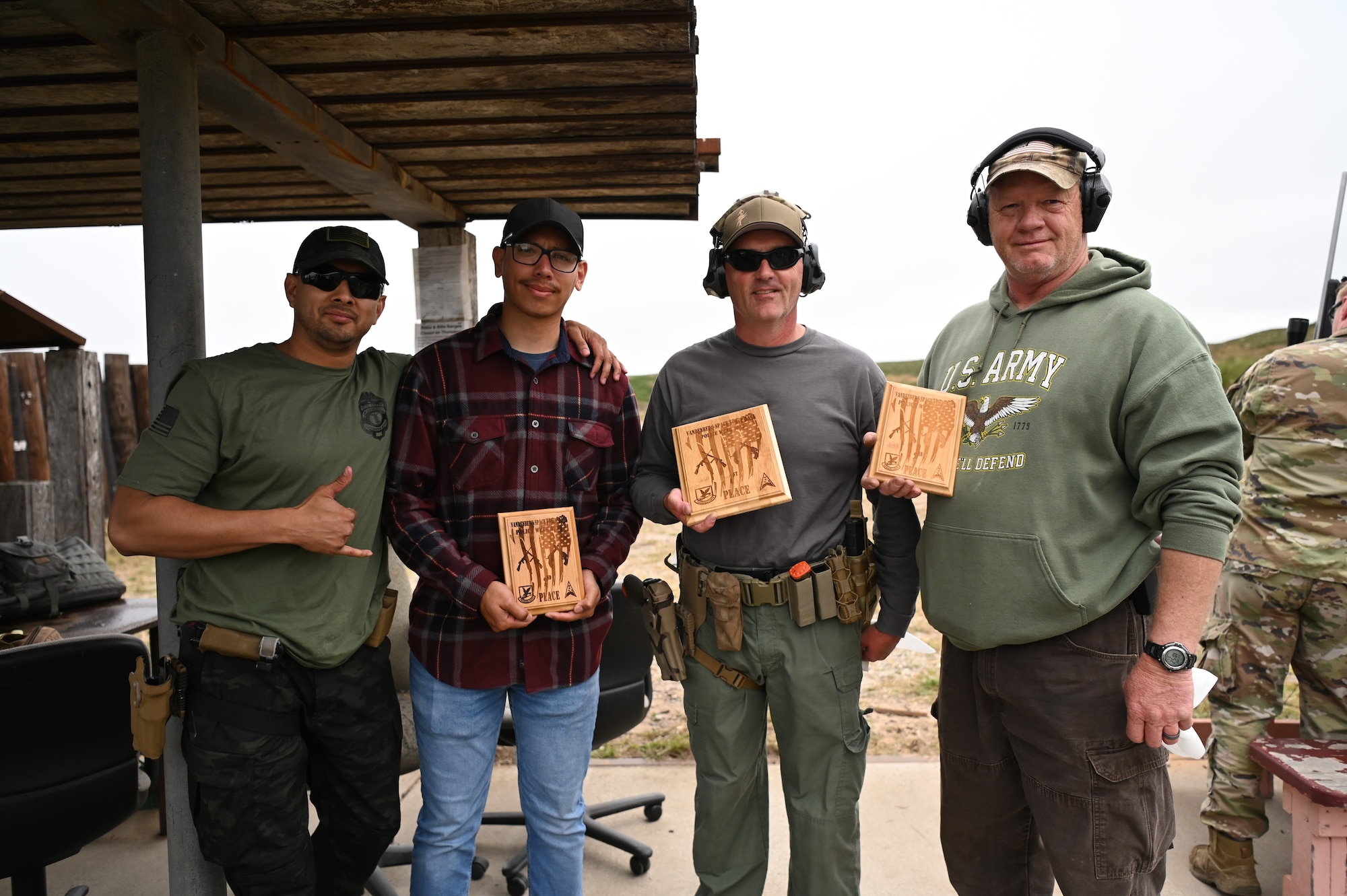 The winners of the Vandenberg Rod and Gun Club shooting competition pose with their plaques at Vandenberg Space Force Base, Calif., May 17, 2023. National Police Week offers honor, remembrance, and peer support, while allowing law enforcement, survivors, and citizens to gather and pay homage to those who gave their lives in the line of duty. (U.S. Space Force photo by Senior Airman Tiarra Sibley)