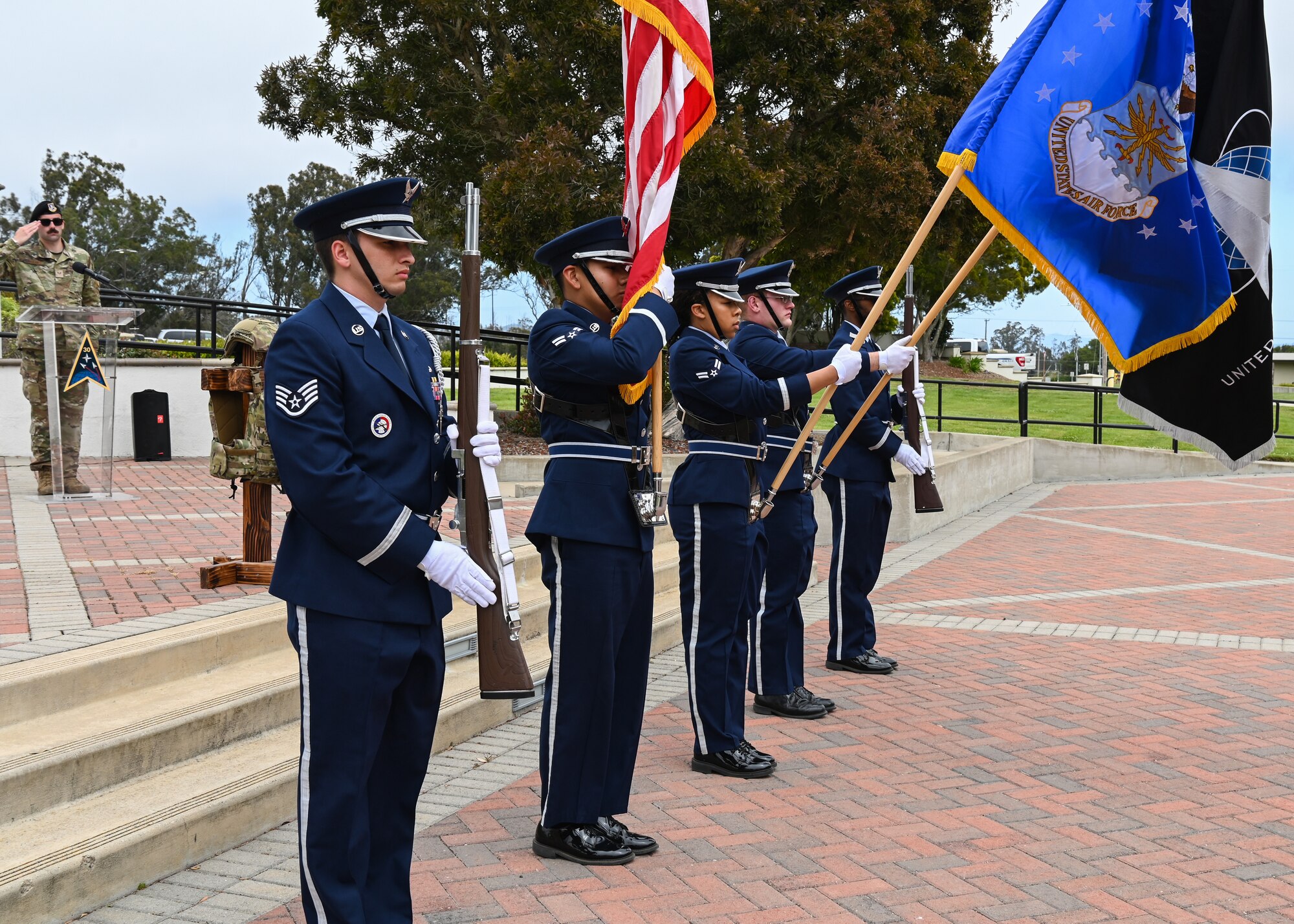 The Vandenberg Space Force Base Honor Guard presents the colors during the closing ceremony for National Police Week at Vandenberg Space Force Base, Calif., May 19, 2023. The 30th Security Forces Squadron held a closing ceremony that honored those who have made the ultimate sacrifice in service to our communities. (U.S. Space Force photo by Senior Airman Tiarra Sibley)