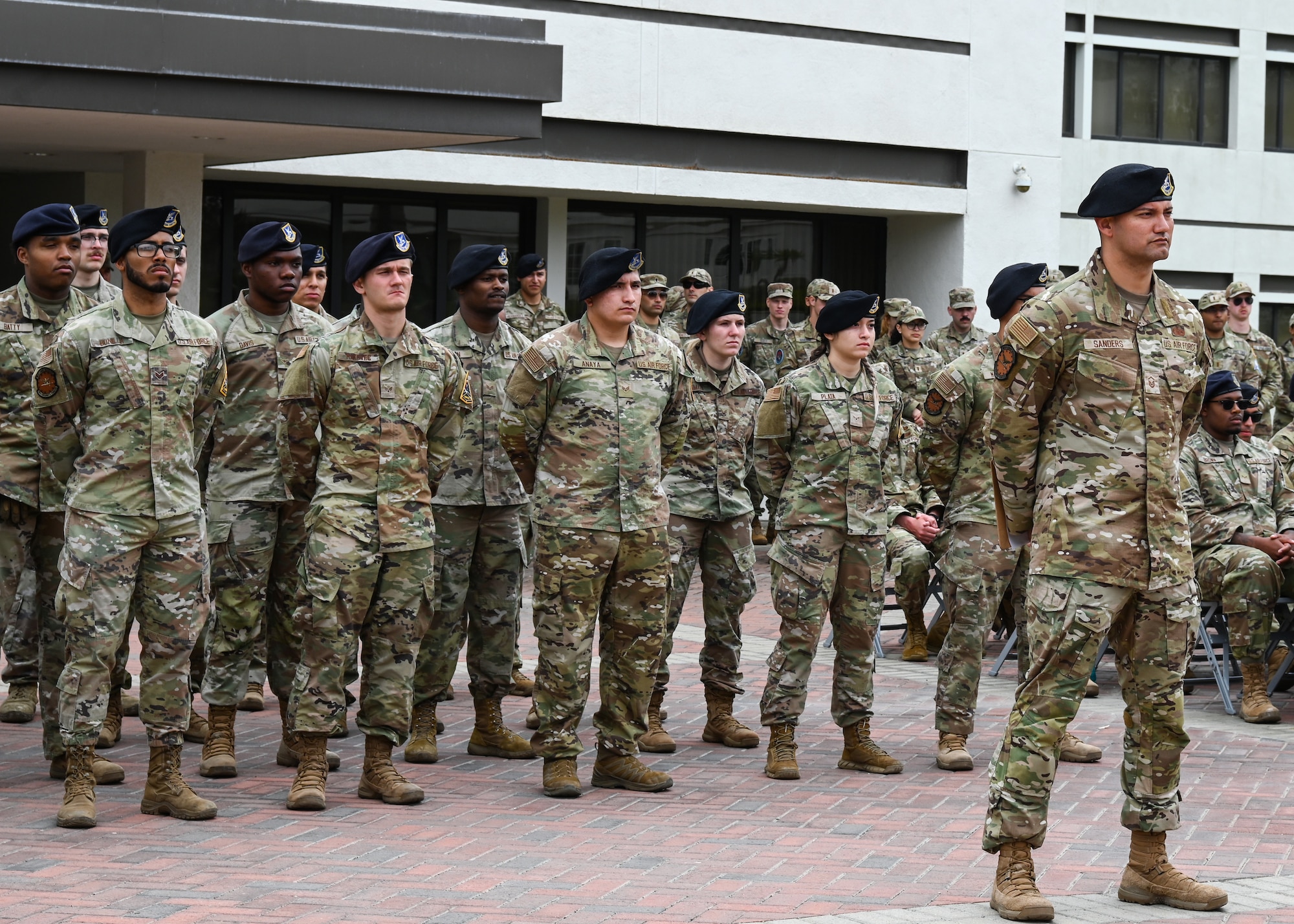 Members of the 30th Security Forces Squadron stands at parade rest during the National Police Week closing ceremony at Vandenberg Space Force Base, Calif., May 19, 2023. The 30th Security Forces Squadron read the names and honored those who have made the ultimate sacrifice in service to our communities. (U.S. Space Force photo by Senior Airman Tiarra Sibley)