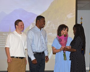 Columbus Air Force Base, 14th Flying Training Wing, Force Support Squadron, Miss., Project Search, graduates it's first students on 23 May 2023 at the CAFB Event Center. US Air Force Lieutenant Colonel Tiffany Sellers, Commander of the 14th Logistics Readiness Squadron, Mr Sam Allison, Superintendent Lowndes County School District and Mr. Chris Howard, Executive Director Miss. Department of Rehabilitation Services, present graduate, Makyia Bibbs, her certificate.