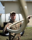 Civil engineer holds tubing