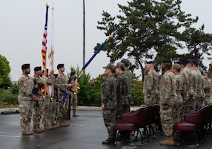 Honor Guardsmen with the 8th Security Forces Squadron post the colors during the 2023 National Police Week opening ceremony at Kunsan Air Base, Republic of Korea, May 22, 2023. During the opening ceremony, the Honor Guard swapped the normal ceremonial rifles for the M4 carbine rifles they carry on duty. (U.S. Air Force photo by Staff Sgt. Sadie Colbert)