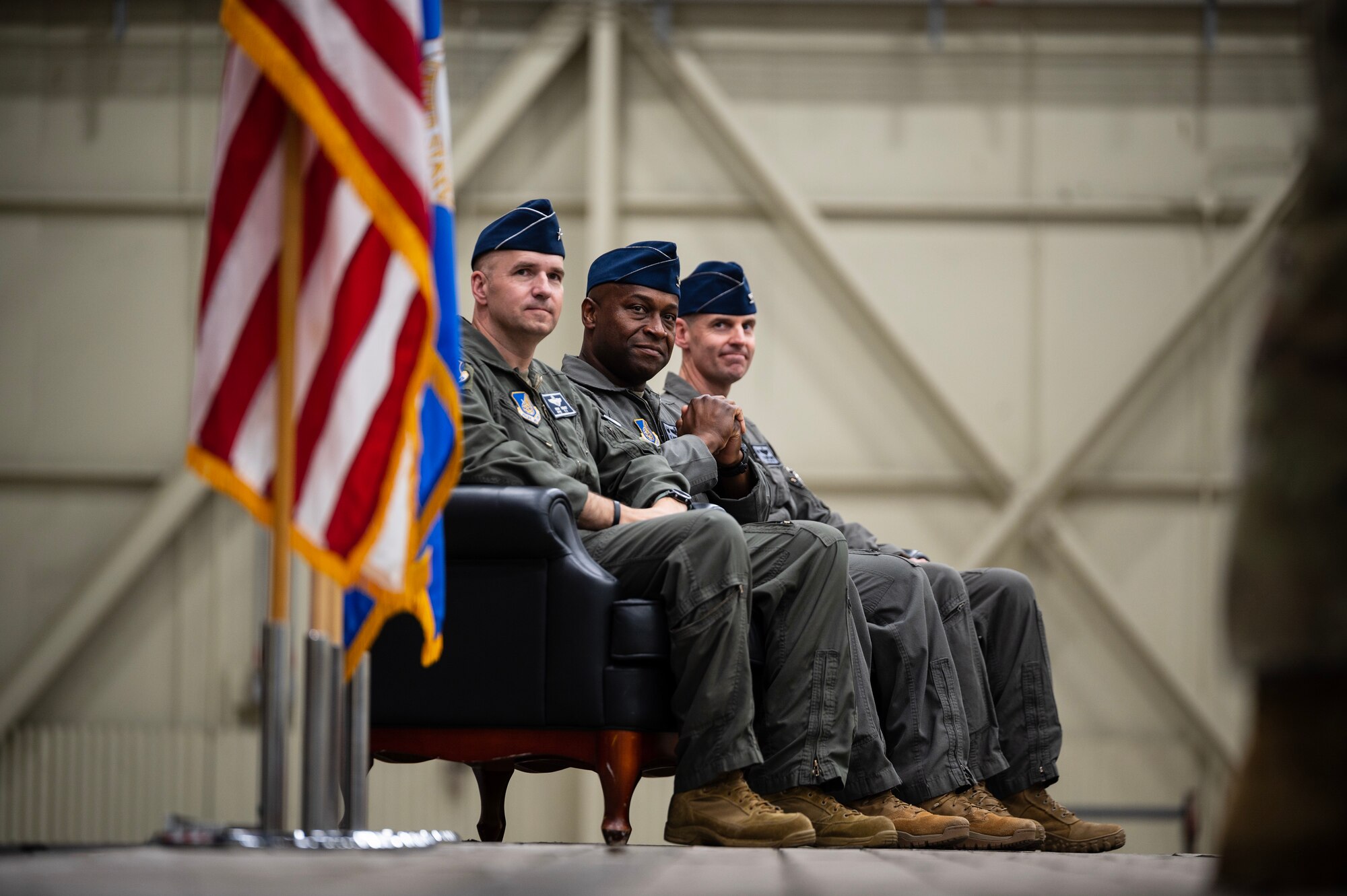 Leaders prepare to participate in change of command ceremony.