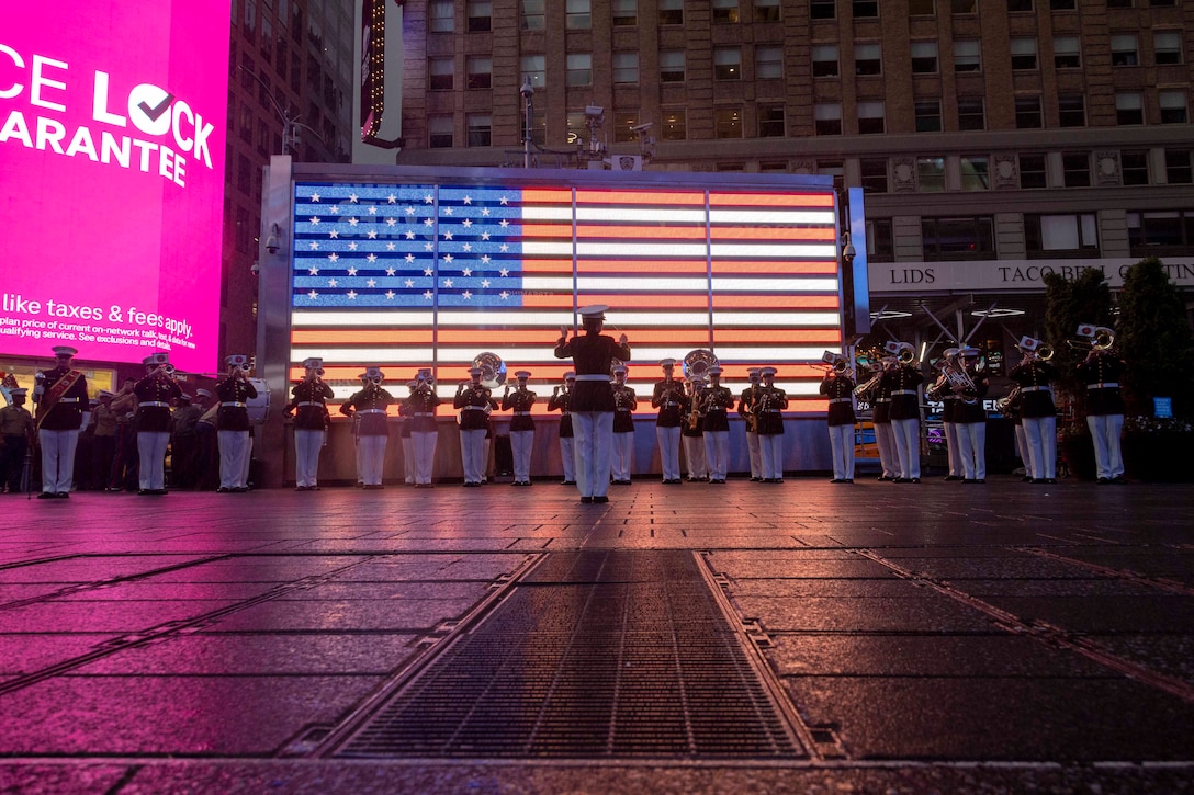 The Quantico Marine Band performs at Times Square, N.Y. during the first day of Fleet Week New York (FWNY), May 24, 2023. During FWNY 2023, more than 3,000 service members from the Marine Corps, Navy and Coast Guard and our NATO allies from Great Britain, Italy and Canada are engaging in special events throughout New York City and the surrounding Tri-State Region, showcasing the latest capabilities of today’s maritime services and connecting with citizens. The events include free public ship tours, military static displays, and live band performances and parades. (Photo by Mass Communication Specialist 1st Class Pedro A. Rodriguez)