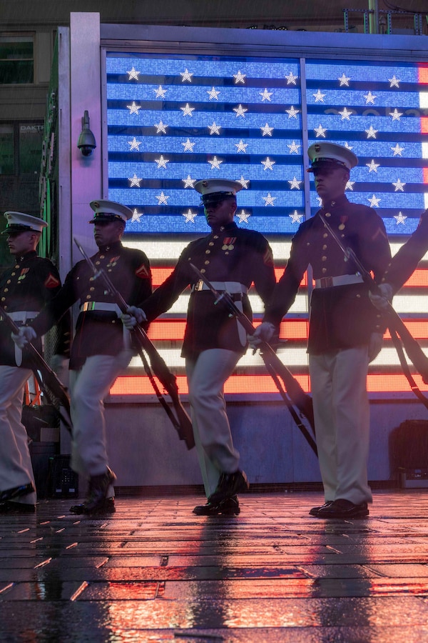 The Marine Corps Silent Drill Platoon performs at Times Square, N.Y. during Fleet Week New York (FWNY), May 24, 2023. During FWNY 2023, more than 3,000 service members from the Marine Corps, Navy and Coast Guard and our NATO allies from Great Britain, Italy and Canada are engaging in special events throughout New York City and the surrounding Tri-State Region, showcasing the latest capabilities of today’s maritime services and connecting with citizens. The events include free public ship tours, military static displays, and live band performances and parades. (Photo by Mass Communication Specialist 1st Class Pedro A. Rodriguez)