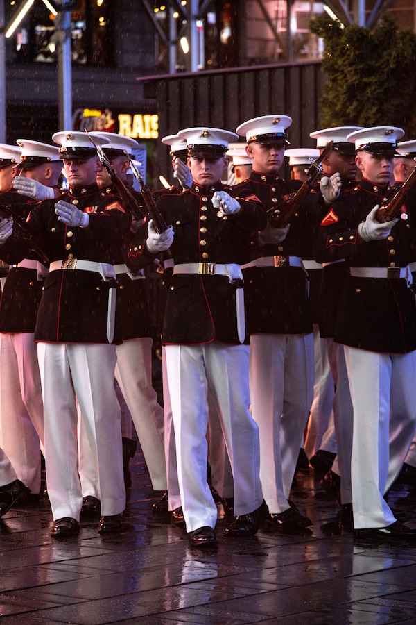 The Marine Corps Silent Drill Platoon performs at Times Square, N.Y. during Fleet Week New York (FWNY), May 24, 2023. During FWNY 2023, more than 3,000 service members from the Marine Corps, Navy and Coast Guard and our NATO allies from Great Britain, Italy and Canada are engaging in special events throughout New York City and the surrounding Tri-State Region, showcasing the latest capabilities of today’s maritime services and connecting with citizens. The events include free public ship tours, military static displays, and live band performances and parades. (Photo by Mass Communication Specialist 1st Class Rachael A. Treon)