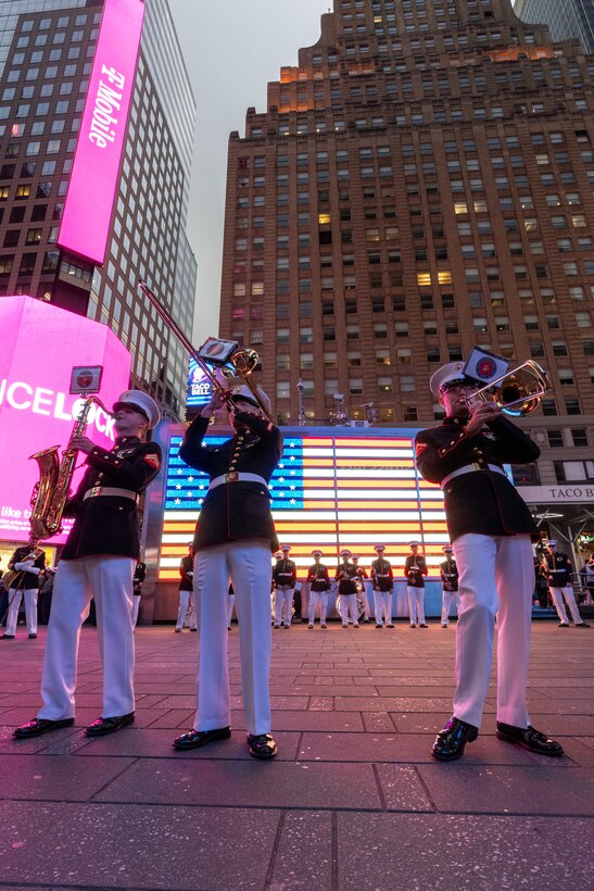 The Quantico Marine Band performs at Times Square, N.Y. during the first day of Fleet Week New York (FWNY), May 24, 2023. More than 3,000 service members from the Marine Corps, Navy and Coast Guard and our NATO allies from Great Britain, Italy and Canada are engaging in special events throughout New York City and the surrounding Tri-State Region during FWNY 2023, showcasing the latest capabilities of today’s maritime services and connecting with citizens. The events include free public ship tours, military static displays, and live band performances and parades. (U.S. Marine Corps photo by Sgt. Juan Carpanzano)