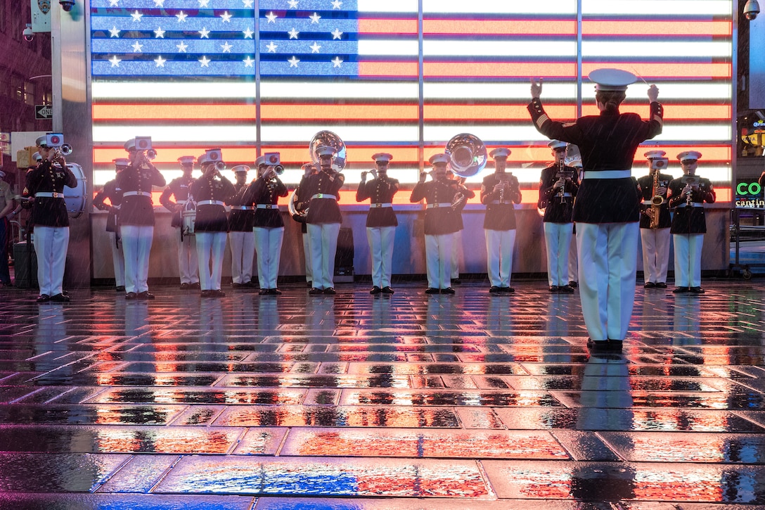 The Quantico Marine Band performs at Times Square, N.Y. during the first day of Fleet Week New York (FWNY), May 24, 2023. More than 3,000 service members from the Marine Corps, Navy and Coast Guard and our NATO allies from Great Britain, Italy and Canada are engaging in special events throughout New York City and the surrounding Tri-State Region during FWNY 2023, showcasing the latest capabilities of today’s maritime services and connecting with citizens. The events include free public ship tours, military static displays, and live band performances and parades. (U.S. Marine Corps photo by Sgt. Juan Carpanzano)