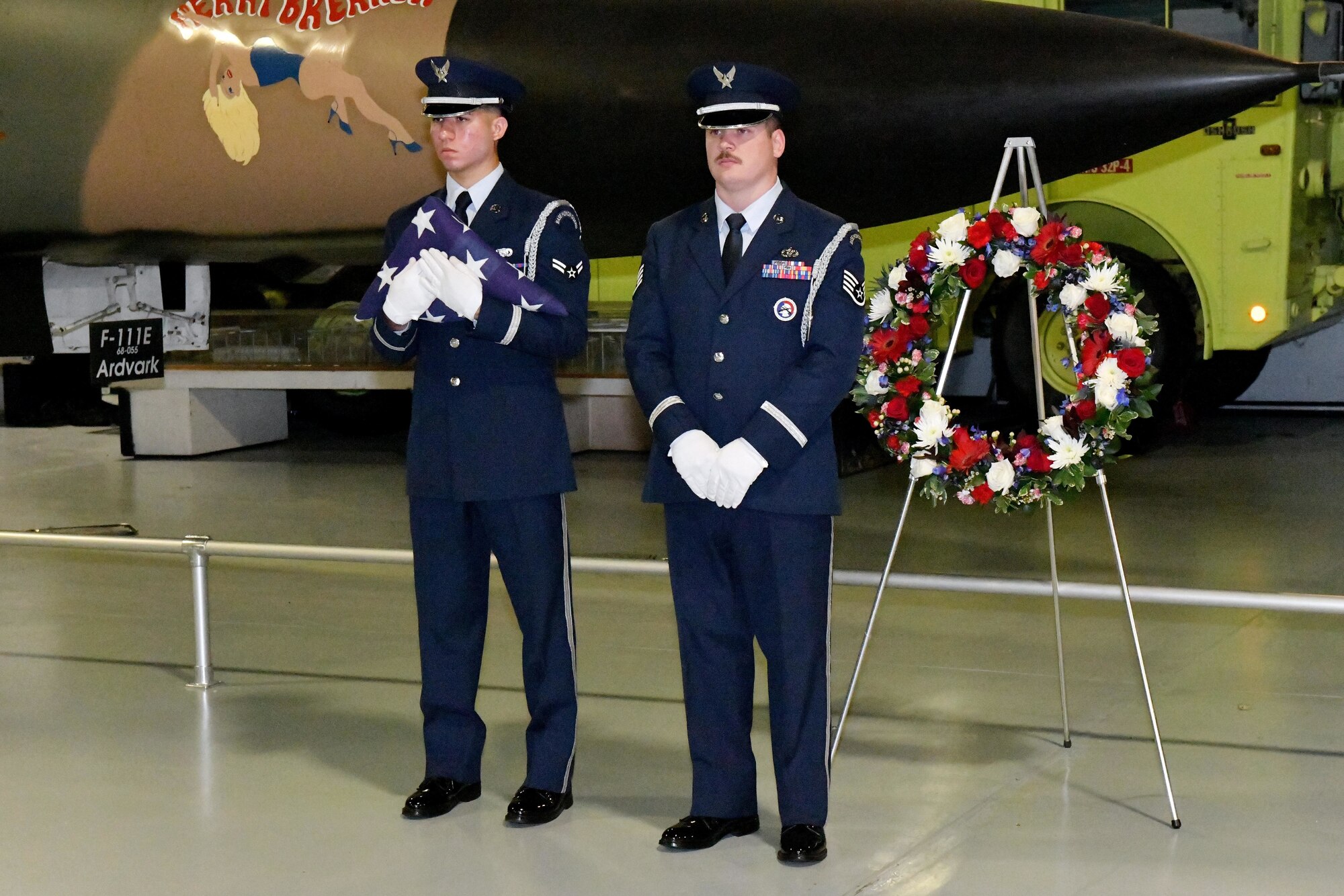 Two men in military uniform standing