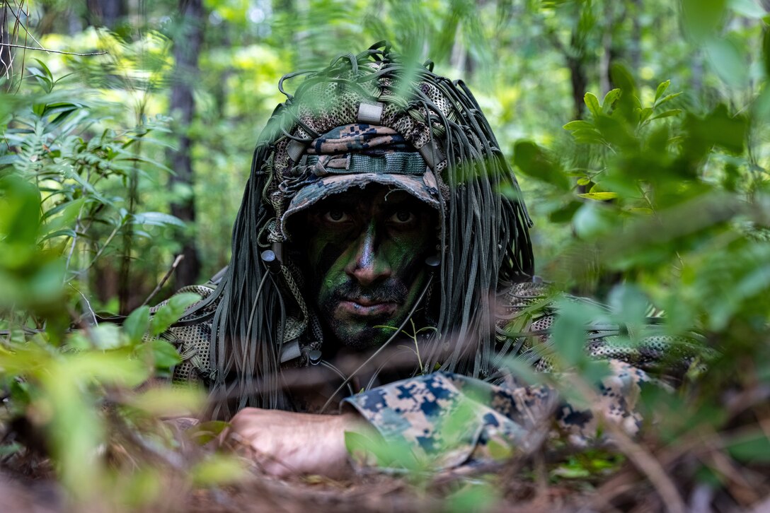 A U.S. Marine with 1st Battalion, 8th Marine Regiment, 2d Marine Division provides security during a Marine Corps Combat Readiness Evaluation (MCCRE) on Camp Lejeune, North Carolina, May 22, 2023. The MCCRE is designed to evaluate and certify a unit's comprehensive warfighting ability as the most ready and lethal unit within the division. (U.S. Marine Corps photo by Lance Cpl. Joshua Kumakaw)