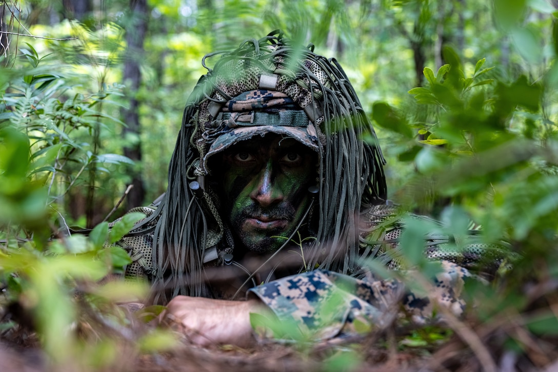 A U.S. Marine with 1st Battalion, 8th Marine Regiment, 2d Marine Division provides security during a Marine Corps Combat Readiness Evaluation (MCCRE) on Camp Lejeune, North Carolina, May 22, 2023. The MCCRE is designed to evaluate and certify a unit's comprehensive warfighting ability as the most ready and lethal unit within the division. (U.S. Marine Corps photo by Lance Cpl. Joshua Kumakaw)