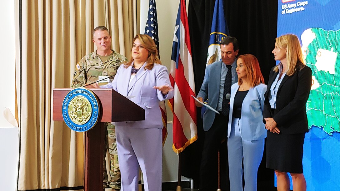 U.S. Army Corps of Engineers, South Atlantic Division commander, Brig. Gen. Daniel Hibner and Puerto Rico Congresswoman Jenniffer Gonzalez-Colon Resident for Puerto Rico, introduces key leadership that is currently coordinating the creation and establishment of Task Force U.S. Virgin Islands and Puerto Rico (TF VIPR) during a press conference that was held in San Juan, Puerto Rico. Task Force U.S. Virgin Islands and Puerto Rico (Task Force VIPR) was created to organize and prioritize the demand of construction projects throughout the Virgin Islands and Puerto Rico.  (USACE photo by Luis Deya)