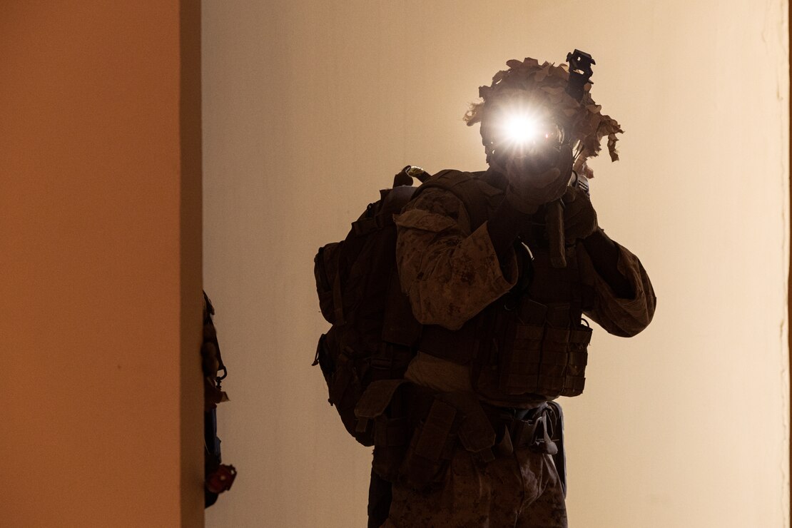U.S. Marine Corps Lance Cpl. Daniel Bratcher with Marine Forces Command clears a room during exercise Intrepid Maven 23.3 in the United Arab Emirates, May 18, 2023. Intrepid Maven 23.3 is a Task Force 51/5-led bilateral exercise between MARCENT and the United Arab Emirates Armed Forces designed to improve interoperability, strengthen partner-nation relationships in the U.S. Central Command area of responsibility, and improve both individual and bilateral unit readiness. Bratcher is a native of Yonkers, New York.