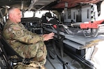 First Sgt. Patrick Casha, flight paramedic with the Oregon Army National Guard, demonstrates the new MH60M Medical Upgrade Interior kit designed for Future Long-Range Assault Aircraft during EDGE 23 Distinguished Visitor Day at Yuma Proving Ground, Arizona, May 18, 2023.