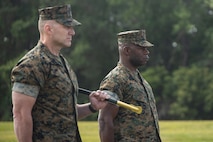 U.S. Marine Corps Sgt. Maj. William J. Gwaltney, left, and Sgt. Maj. Wesley O. Turner II stand at attending before the passing of the Sword of Office during a Relief and Appointment Ceremony on Camp Lejeune, North Carolina, May 24, 2023. The Relief and Appointment Ceremony serves as the official changeover between Sergeants Major, honoring the outgoing Sgt. Maj's contributions to the unit while offering the opportunity for the oncoming SgtMaj to introduce himself to the Marines now under their charge. (U.S. Marine Corps photo by Lance Cpl. Alfonso Livrieri)