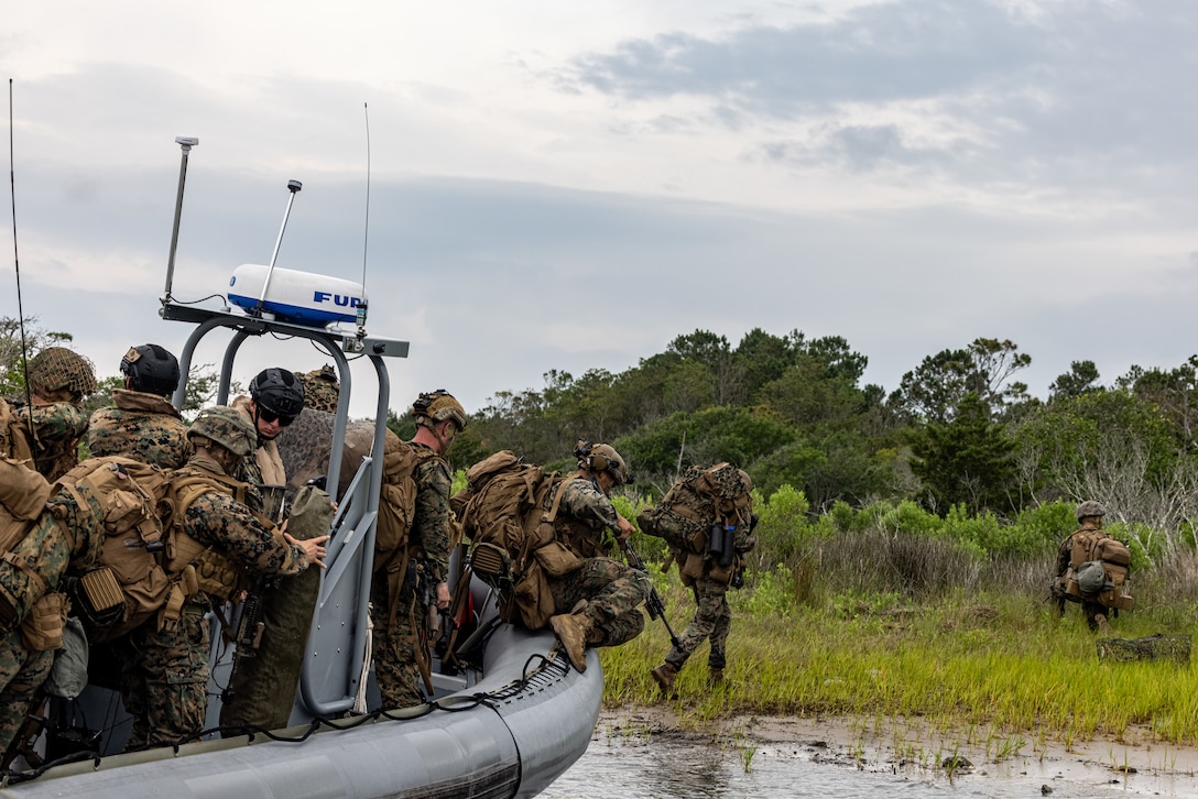 U.S. Marines with 1st Battalion, 8th Marine Regiment, 2d Marine Division conduct a tactical movement during a Marine Corps Combat Readiness Evaluation (MCCRE) on Camp Lejeune, North Carolina, May 21, 2023.