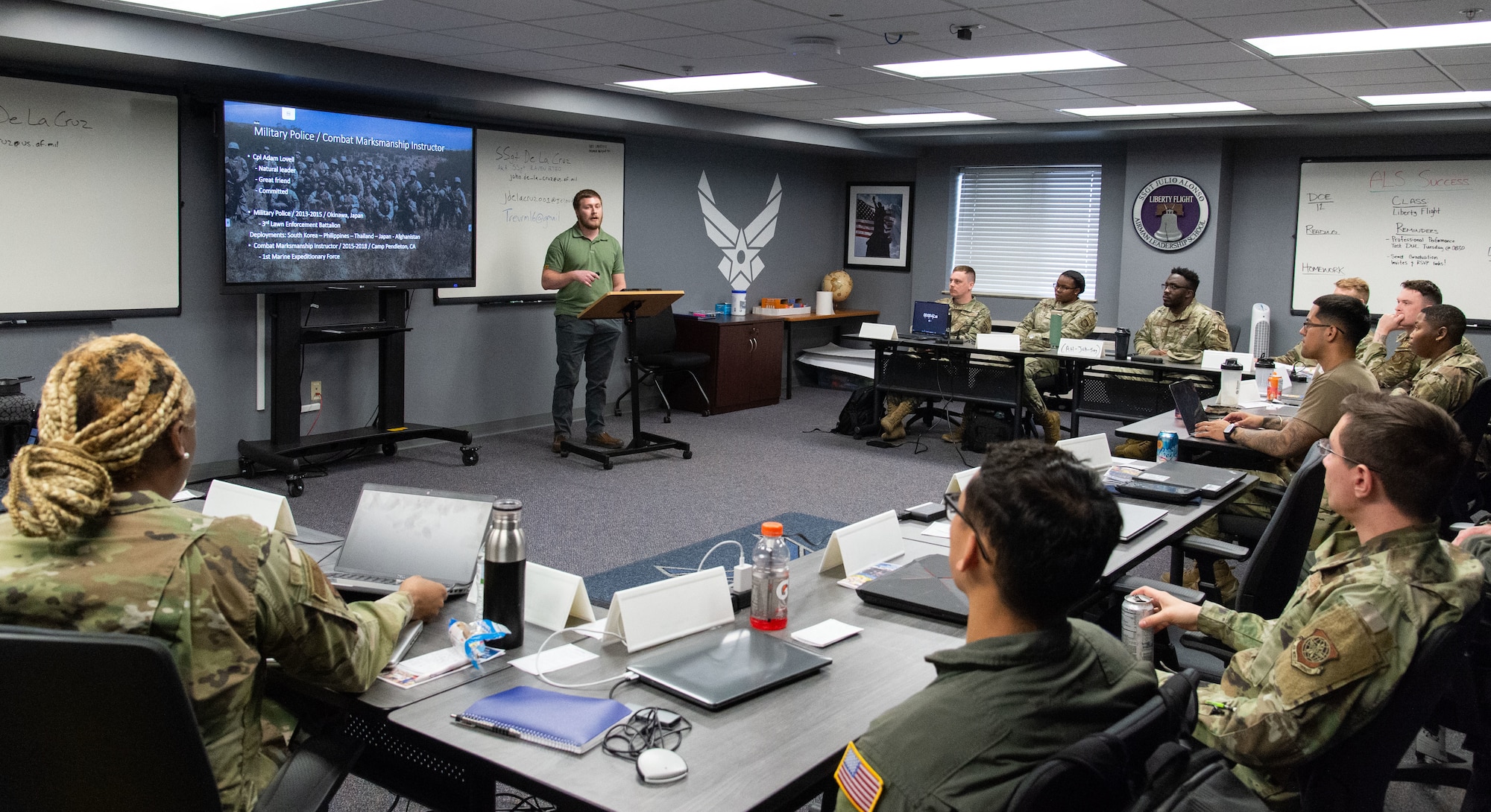 Dillon Lackus, Air Force Mortuary Affairs Operations mortuary clerk, delivers his presentation to fellow Liberty Flight classmates at the Staff Sgt. Julio Alonso Airman Leadership School on Dover Air Force Base, Delaware, May 2, 2023. Lackus was the first civilian Airman to graduate from the five-week course that prepares military and civilian Airmen for leadership roles in the Air Force. (U.S. Air Force photo by Roland Balik)