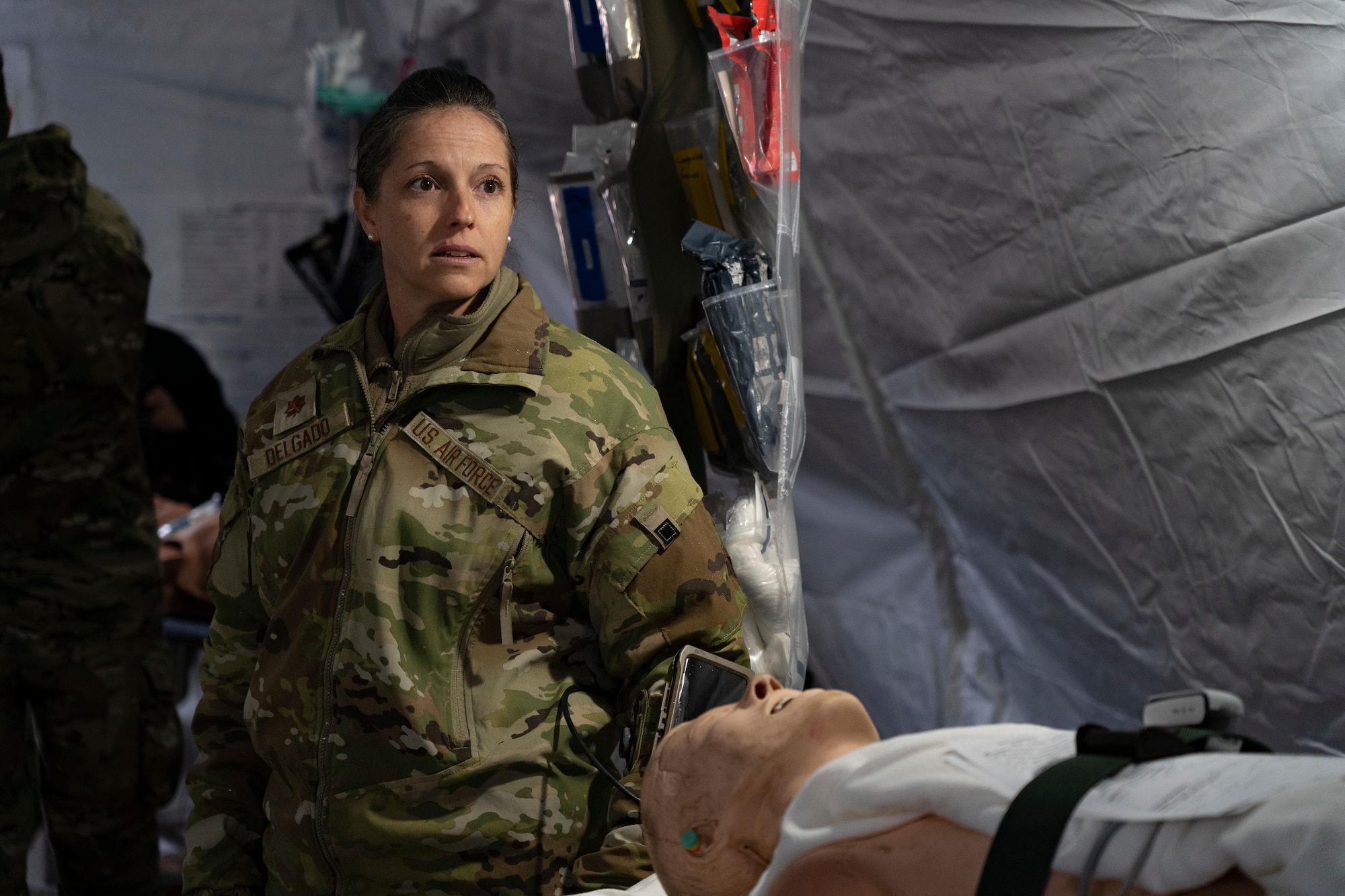 U.S. Air Force Maj. Laura Delgado, 176th Medical Group Chief Nurse prepare for practical exercises during Northern Edge 23-1 at Joint Base Elmendorf-Richardson, Alaska, May 12, 2023.
