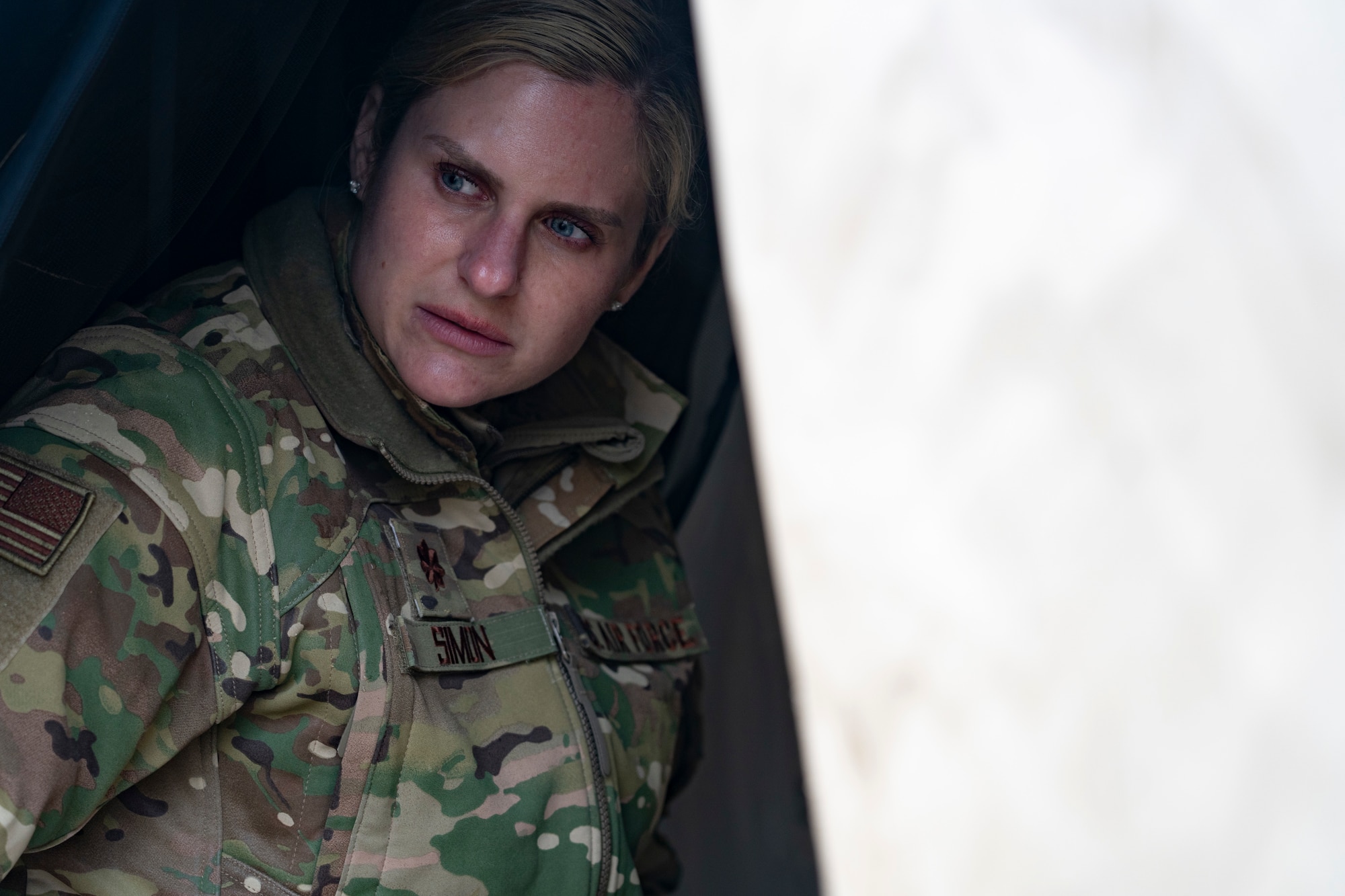 U.S. Air Force Maj. Erica Simon, emergency medical services physician, and EMS consultant to the surgeon general prepare for practical exercises during Northern Edge 23-1 at Joint Base Elmendorf-Richardson, Alaska, May 12, 2023.