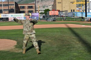 Col. Jeffrey Holland, 75th Air Base Wing commander, throws out the first pitch at an Ogden Raptors game May 24. It was Military Affairs Baseball Night at the ballpark, an annual game set aside to pay tribute to men and women serving at Hill Air Force Base. (U.S. Air Force Photo by Kendahl Johnson)