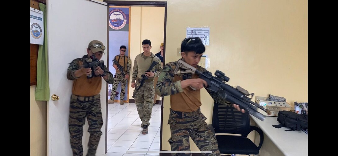 Armed Forces of the Philippines Naval Special Warfare Operators conduct close-quarters training with members of U.S. Coast Guard Maritime Security Response Team West (MSRT West) members as part of Balikatan 23 near El Nido, Philippines, April 14. 2023. MSRT West personnel operated in multiple locations throughout the Philippines and provided maritime interdiction operations training alongside other U.S. and Philippine armed forces. (U.S. Coast Guard courtesy photo).