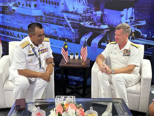 Adm. Samual Paparo, commander, U.S. Pacific Fleet, has a bilateral meeting with Vice Adm. Datuk Saiful Lizan Bin Inrahim, deputy director general for logistics, Malaysian Maritime Enforcement Agency, during Langkawi International Maritime and Aerospace Exhibition 2023 in Langkawi, Malaysia, May 24, 2023. The visit to Malaysia underscored the United States’ commitment to strengthening alliances and partnerships for an enduring resilient, free and open Indo-Pacific. (Photo courtesy of U.S. Navy)
