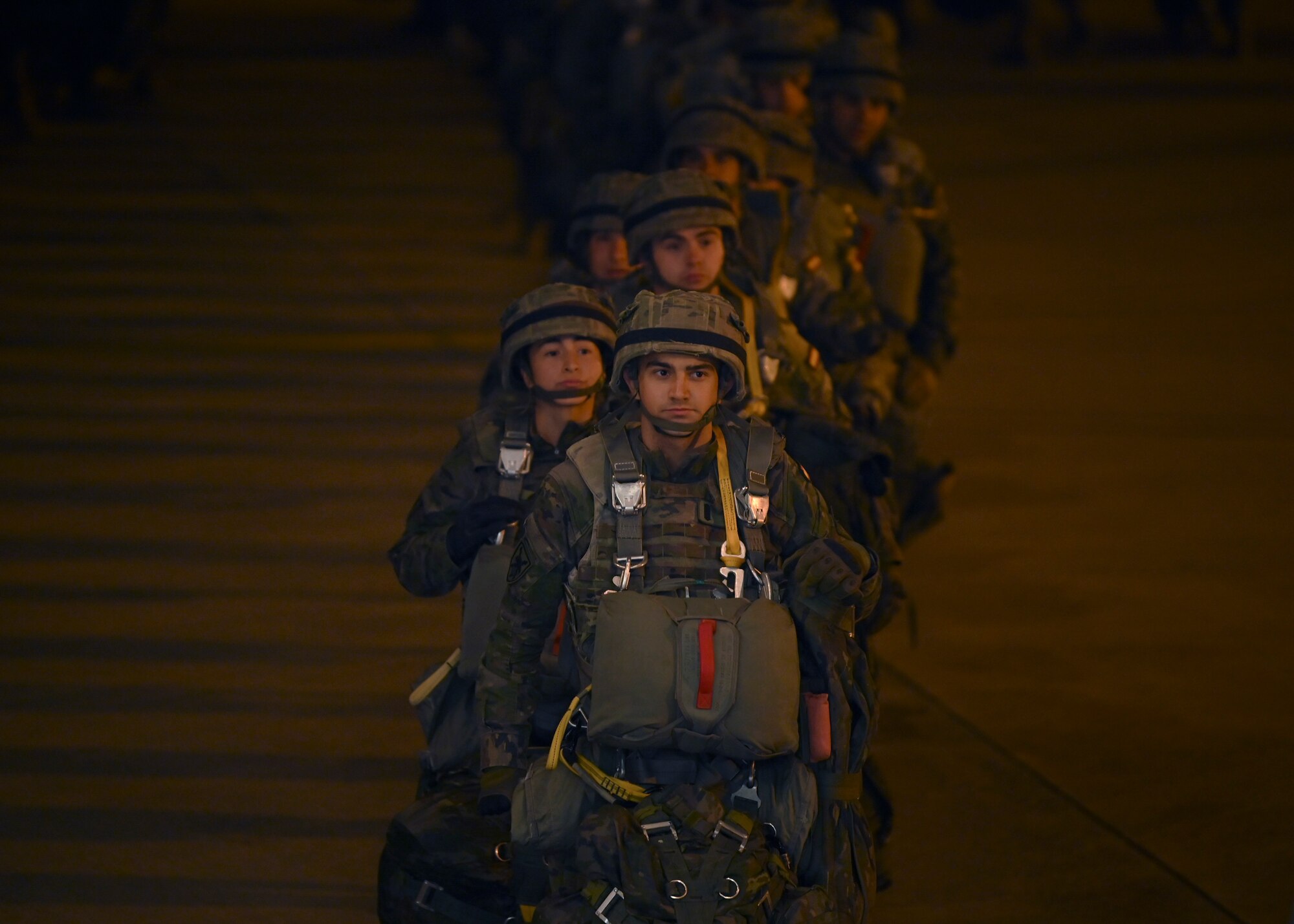 Spanish paratroopers with the Grupo De Artilleria board a C-17 Globemaster III assigned to Joint Base Lewis-McChord, Washington, during DEFENDER 23 at Base Aerea De Zaragoza, Spain, May 10, 2023. DEFENDER 23 is a U.S. Army Europe and Africa-led exercise, supported by U.S. Air Forces in Europe – Air Forces Africa, focused on the strategic deployment of continental United States-based forces and interoperability with Allies and partners. Taking place from April 22 to June 23, DEFENDER 23 demonstrates the U.S. Air Force’s ability to aggregate U.S.-based combat power quickly in Europe; increase lethality of the NATO Alliance through the U.S. Air Force’s Agile Combat Employment; build unit readiness in a complex joint, multi-national environment; and leverage host nation capabilities to increase USAFE-AFAFRICA’s operational reach. DEFENDER 23 includes more than 7,800 U.S. and 15,000 multi-national service members from various Allied and partner nations. (U.S Air Force photo by Senior Airman Callie Norton)