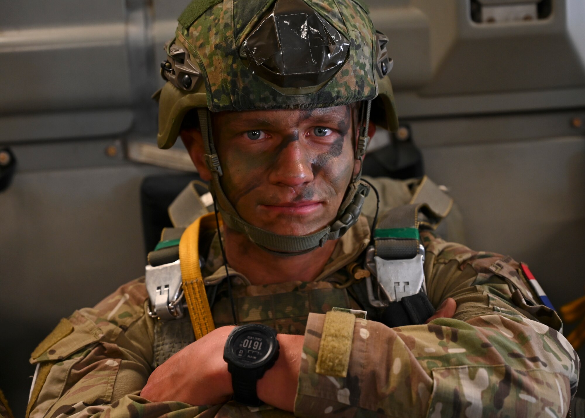 A Dutch paratrooper assigned to 11 Luchtmobiele Brigade flies on a C-17 Globemaster III assigned to the 62d Airlift Wing prior to a static line jump during Exercise Swift Response over Greece, May 12, 2023. Swift Response is an exercise related to DEFENDER 23. DEFENDER 23 is a U.S. Army Europe and Africa-led exercise, supported by U.S. Air Forces in Europe – Air Forces Africa, focused on the strategic deployment of continental United States-based forces and interoperability with Allies and partners. Taking place from April 22 to June 23, DEFENDER 23 demonstrates the U.S. Air Force’s ability to aggregate U.S.-based combat power quickly in Europe; increase lethality of the NATO Alliance through the U.S. Air Force’s Agile Combat Employment; build unit readiness in a complex joint, multi-national environment; and leverage host nation capabilities to increase USAFE-AFAFRICA’s operational reach. DEFENDER 23 includes more than 7,800 U.S. and 15,000 multi-national service members from various Allied and partner nations. (U.S Air Force photo by Senior Airman Callie Norton)