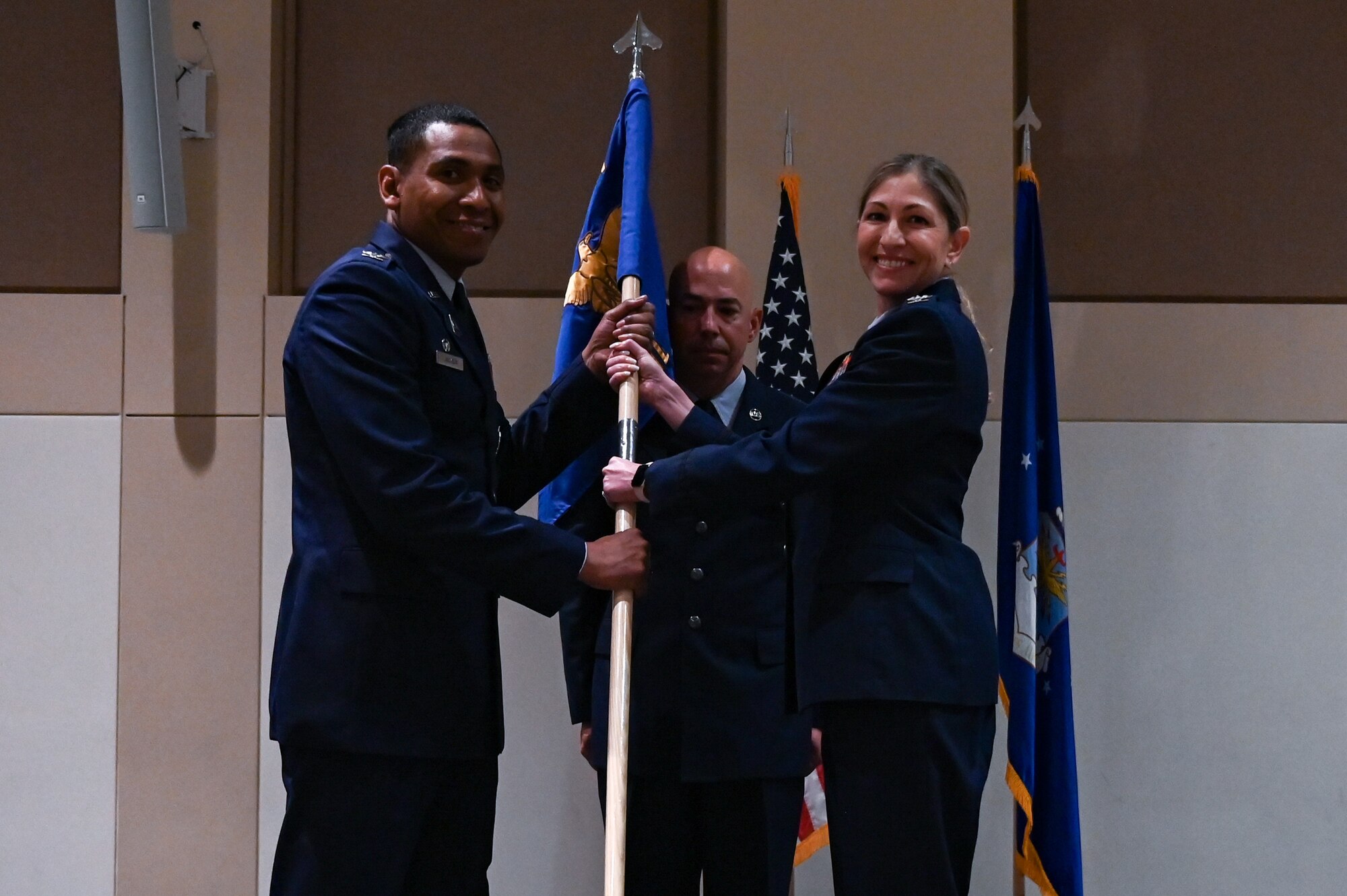 Officers pose for a change of command photo.