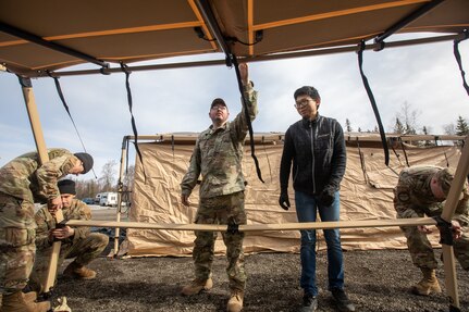 U.S. Air Force water and fuel systems maintenance personnel assigned to 773rd Civil Engineer Squadron, set up tents for an Agile Combat Employment air transportable clinic during Northern Edge 23-1 at Joint Base Elmendorf-Richardson, Alaska, May 9, 2023.