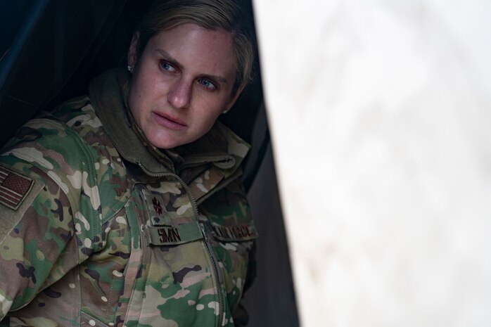 U.S. Air Force Maj. Erica Simon, emergency medical services physician, and EMS consultant to the surgeon general prepare for practical exercises during Northern Edge 23-1 at Joint Base Elmendorf-Richardson, Alaska, May 12, 2023.