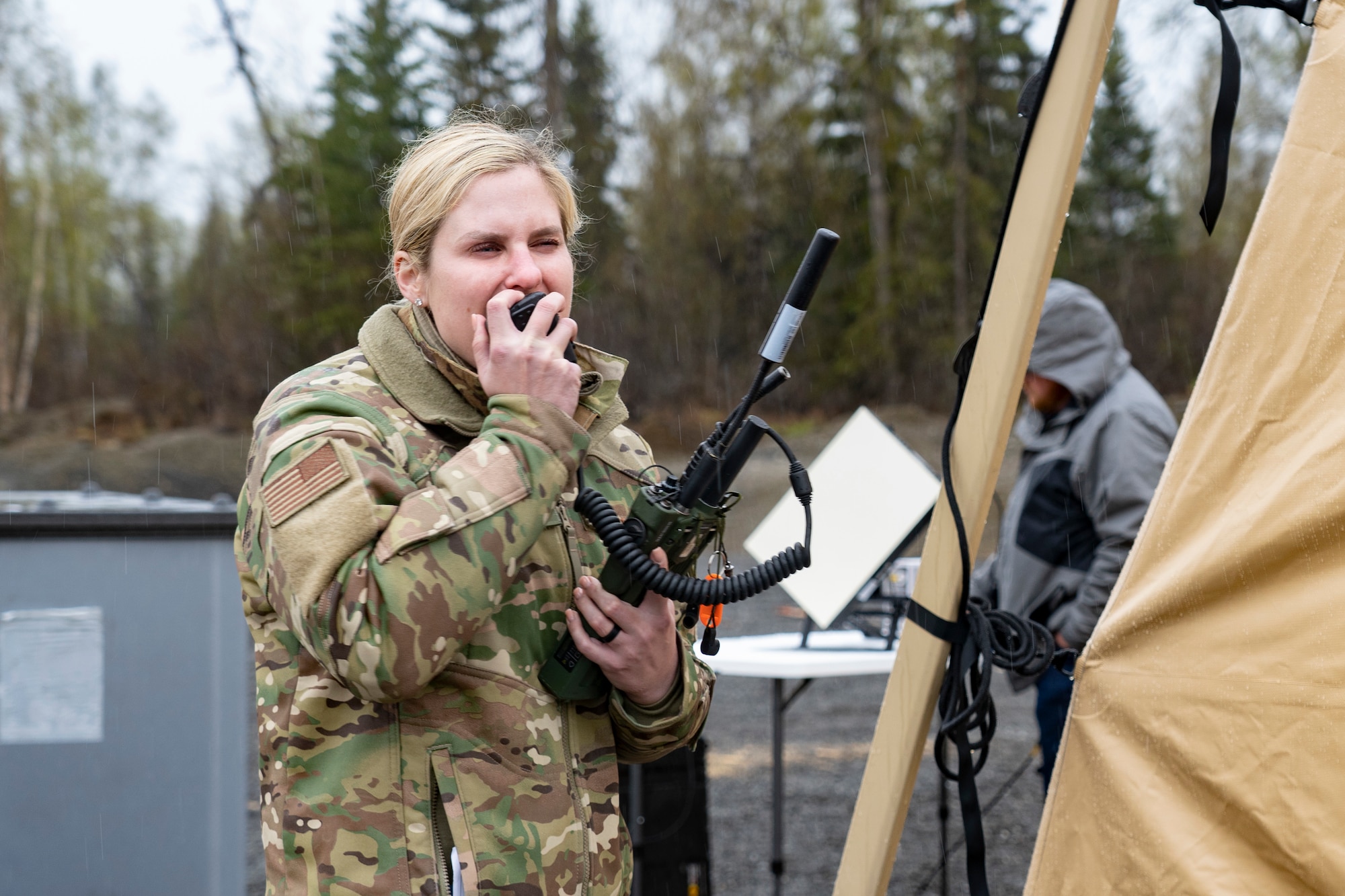 U.S. Air Force Maj. Erica Simon, emergency medical services physician, and EMS consultant to the surgeon general prepare for practical exercises during Northern Edge 23-1 at Joint Base Elmendorf-Richardson, Alaska, May 12, 2023.