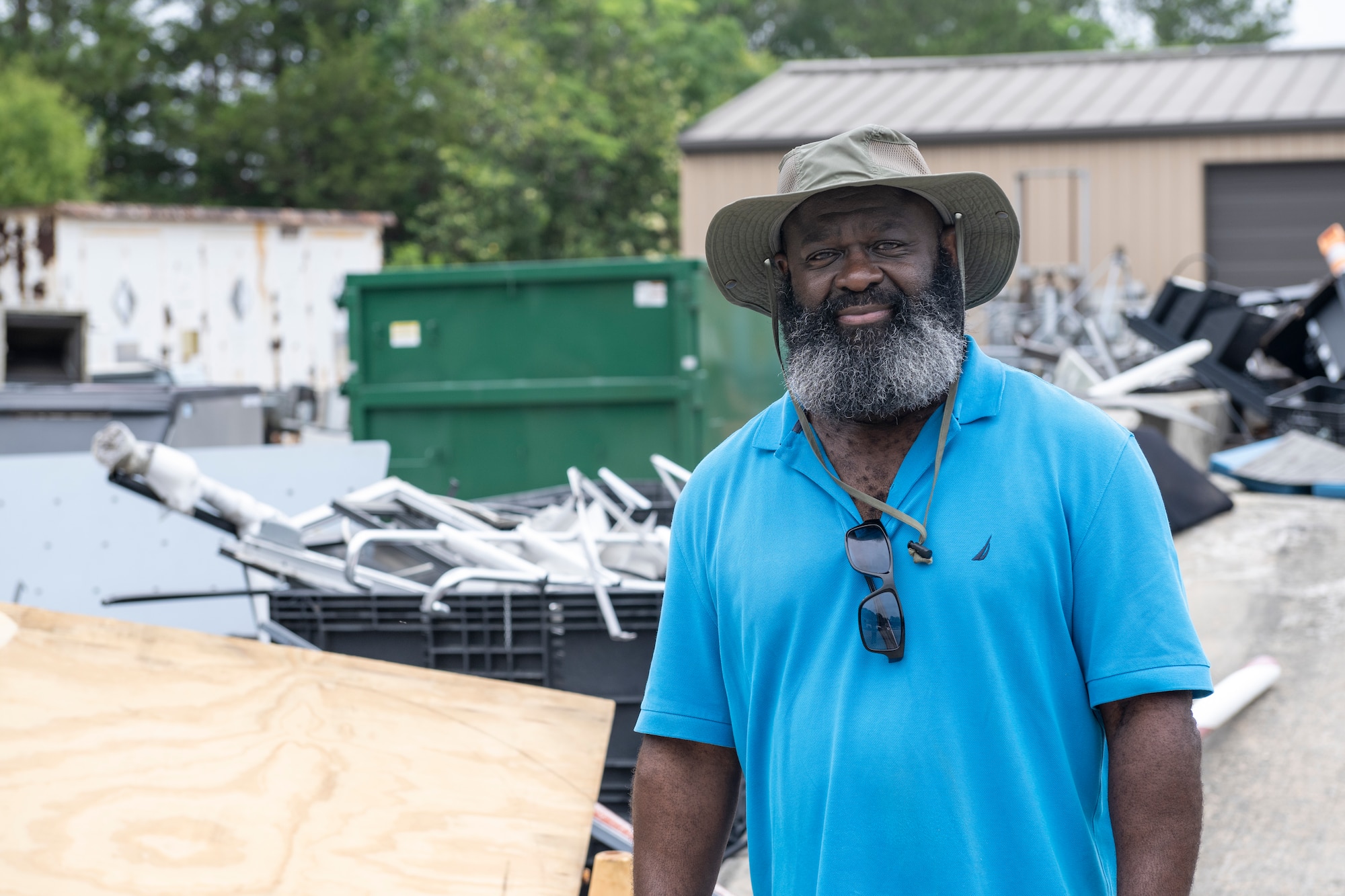 Elvis Lane, 23rd Civil Engineer Squadron environmental specialist, poses for a photo at the recycling center