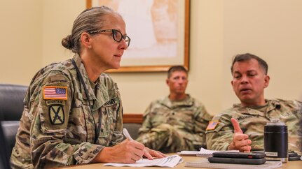 Joint Task Force-Red Hill (JTF-RH) Deputy Commander, U.S. Army Brig. Gen. Michelle Link, receives a brief at the JTF-RH Headquarters on Ford Island, Hawaii, May 22, 2023.