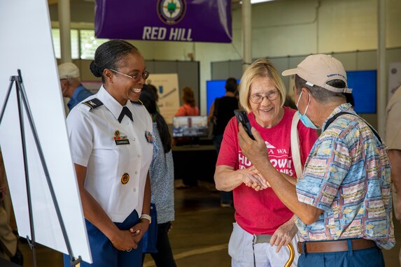 Joint Task Force-Red Hill (JTF-RH) Acting Training Director, U.S. Army Col. Dominique Cummings, engages with local residents during JTF-RH’s Defueling Open House on Ke’ehi Lagoon Memorial in Honolulu, Hawaii, May 23, 2023.